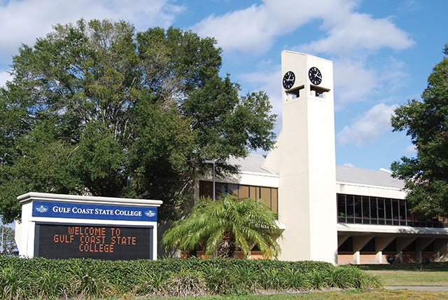 GCSC Clock tower overlooking the grassy area outside of the library.